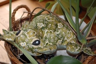 Joan Williamson made this 12” long frog using the same fabric she bought and used to make toys for her children, 50 years ago.  This the first time Joan has made a toy in many years